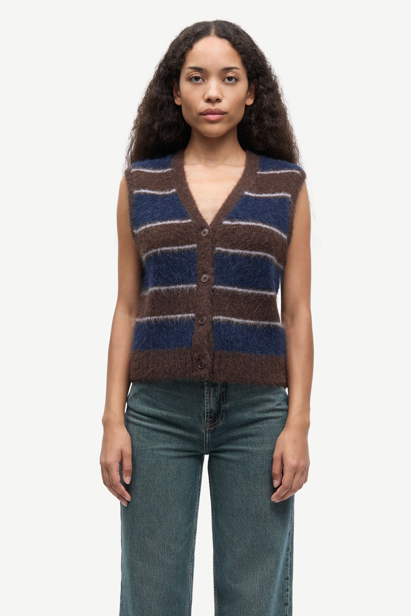 Sajeanne vest 15425 Black Coffee St.